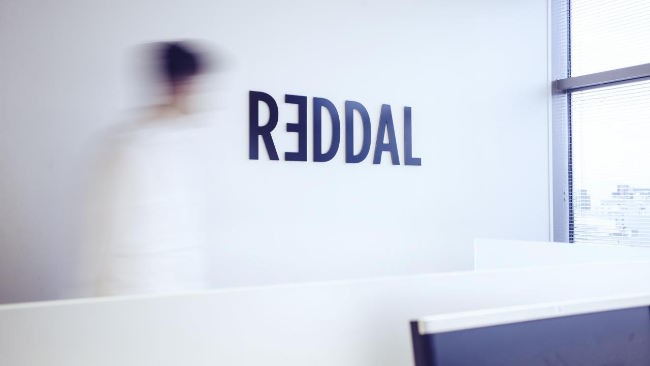 Reddal's office with the text Reddal on a white wall