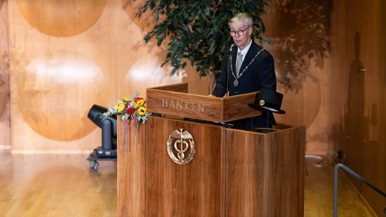 Rector Ingmar Björkman speaking om stage at the Opening of the Academic Year 2026