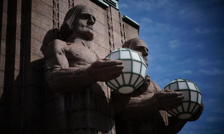 A picture of the statues outside Helsinki railway station