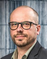 Porträttbild av Oskar Korkman 