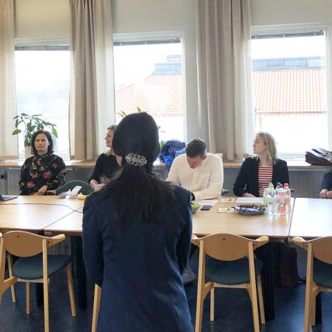 Students presenting their work to a jury