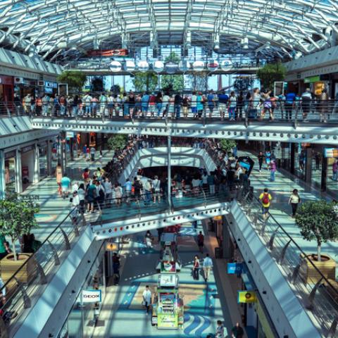 Shopping mall with customers walking