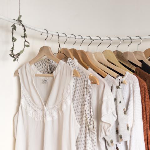 Clothes hanging on a rail
