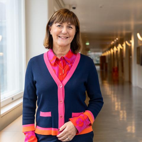Jannica Fagerholm standing in a corridor at Hanken