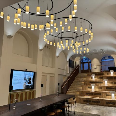 Interior of the Inverto office in Stockholm, lamps hanging over an office table